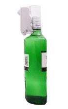 Bottlelox Security device used by retailers for preventing the shoplifting of wine, spirits and other liquor in the AM 58KHz and RF 8.2MHz frequency shown on a green bottle
